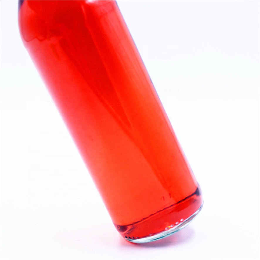 Stocked 330ml clear transparent empty sparking soda water carbonate beverage cocktail breezer beer glass bottle with lid