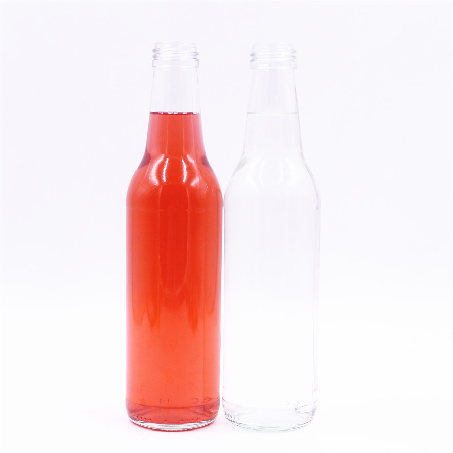Stocked 330ml clear transparent empty sparking soda water carbonate beverage cocktail breezer beer glass bottle with lid