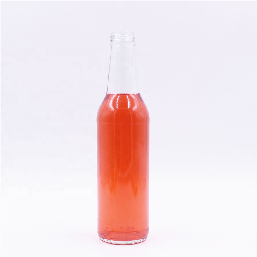 Stocked 330ml clear transparent empty sparking soda water carbonate beverage cocktail breezer beer glass bottle with lid