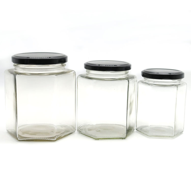 Stocked wide mouth glass pickle / jam / honey storage jar with black twist off lid