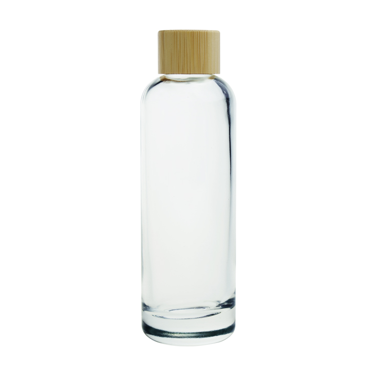 Stocks 100ml clear glass bottle with bamboo cap for oil, toner, lotion