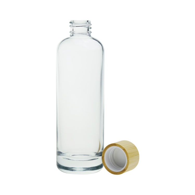 Stocks 100ml clear glass bottle with bamboo cap for oil, toner, lotion
