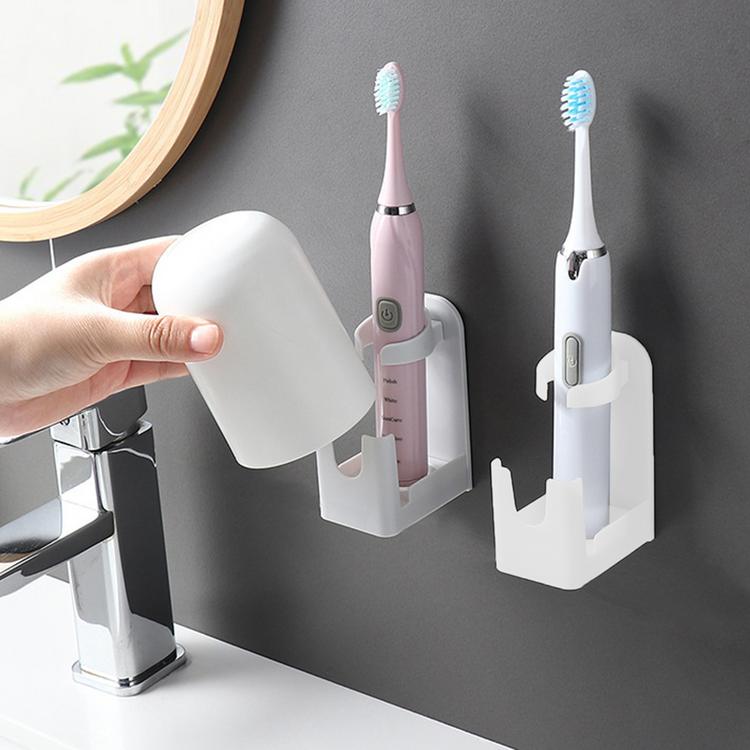 Storage shelf rack electric toothbrush holder sticky wall hanging free punch creative simple universal toothbrush base
