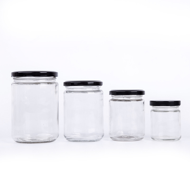Straight sided round clear glass honey food jam jar with twist off lug gold metal lid