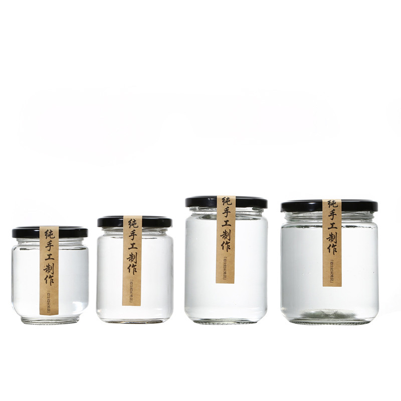 Straight sided round clear glass honey food jam jar with twist off lug gold metal lid