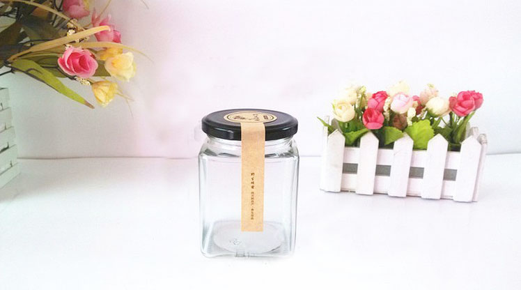 Straight sided round clear glass honey food jam jar with twist off lug gold metal lid