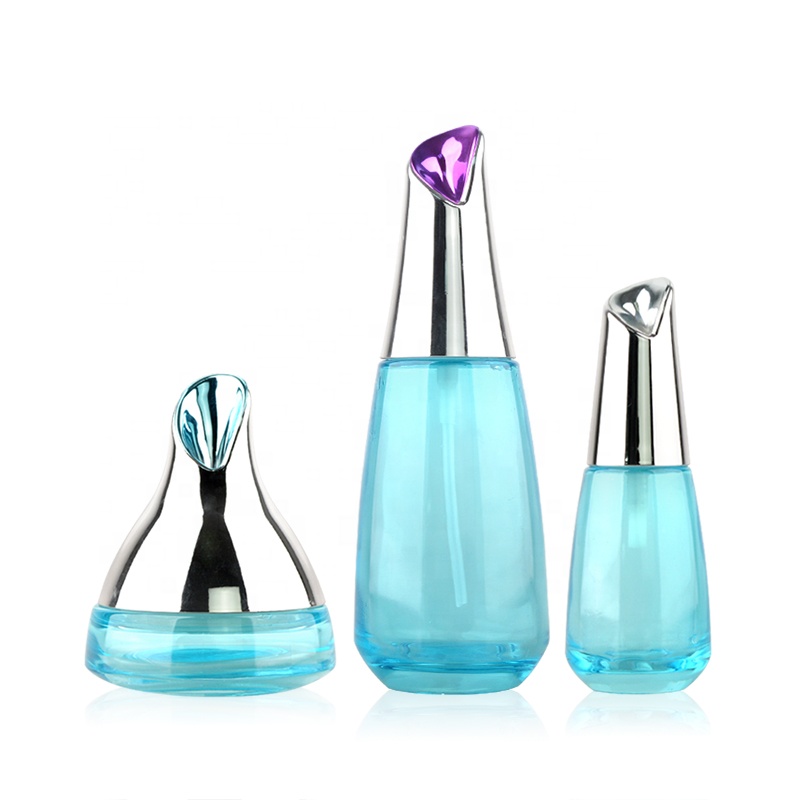 Super design blue clear glass pump bottles for skincare with aluminum cap