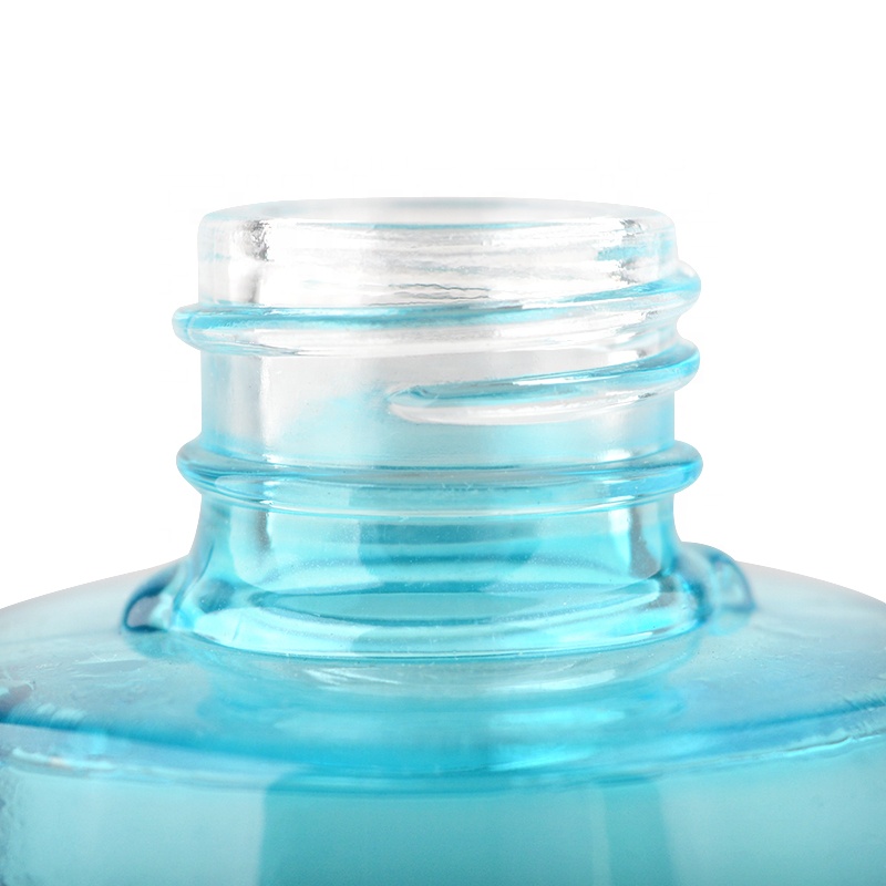 Super design blue clear glass pump bottles for skincare with aluminum cap