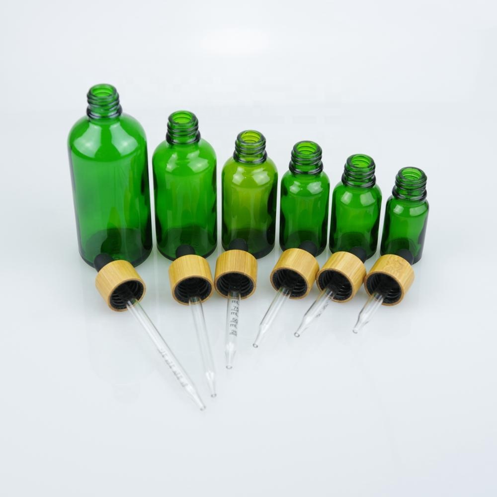 Super quality green color glass essential oil bottle with 18/415 bamboo dropper cap