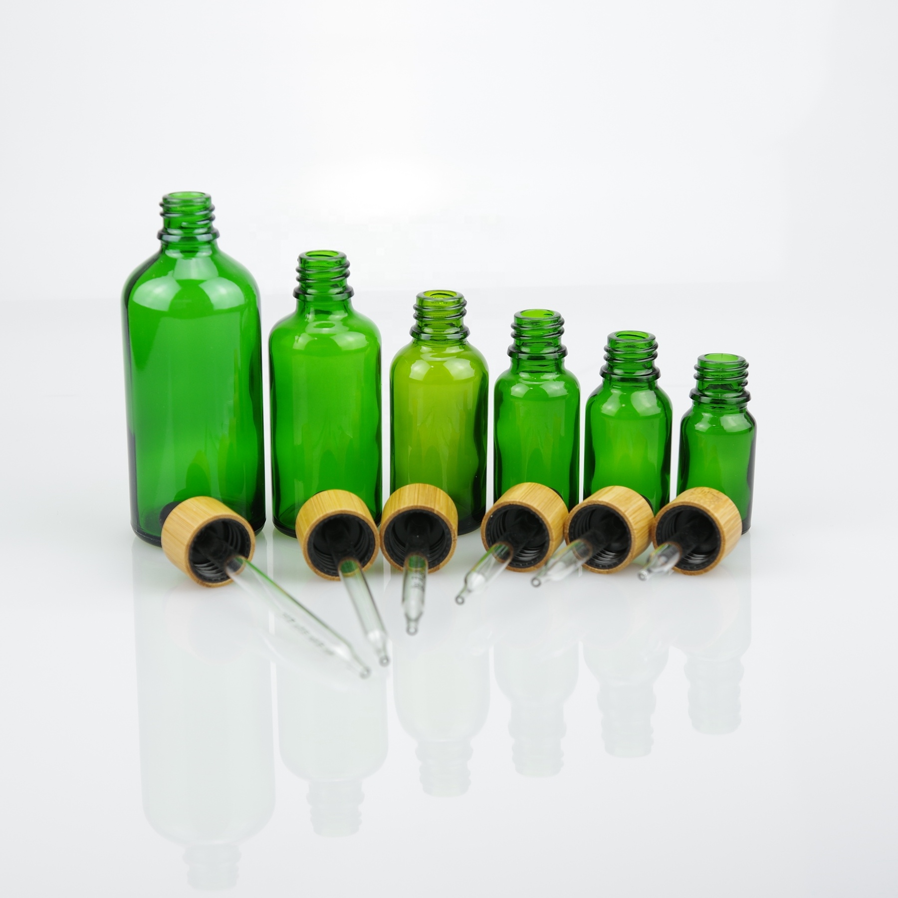 Super quality green color glass essential oil bottle with 18/415 bamboo dropper cap