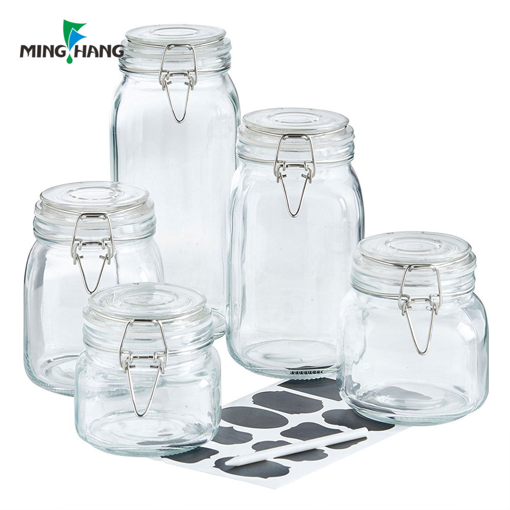 Supply empty transparent glass storage jars cereal grains food storage bottles with cap
