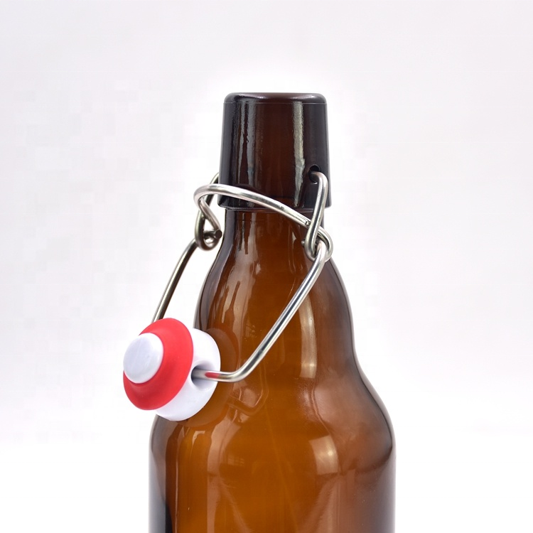 The factory direct sale 330ml 12 oz spot brown beer bottle buckle transparent glass bottle beverage bottle can be customized