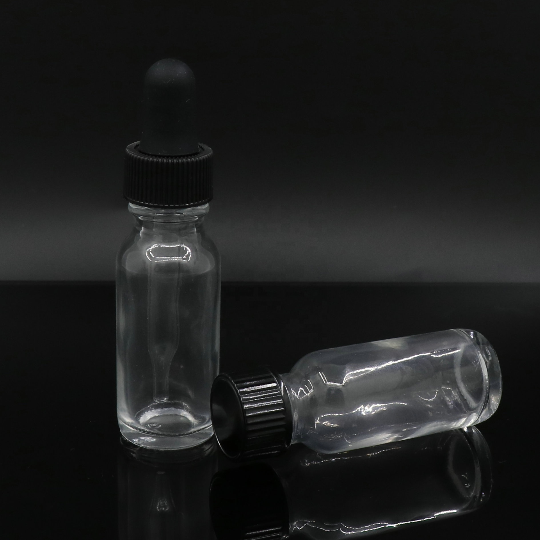 Top Quality 30 ml Clear Amber Boston Round Glass Pump Spray Bottle 30ml Wholesale with White Black Fine-mist Sprayers