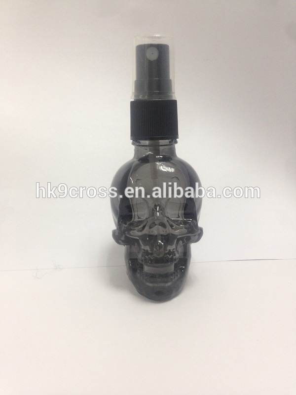 Top quality 30ml perfume bottle lotion skull shaped spray bottle