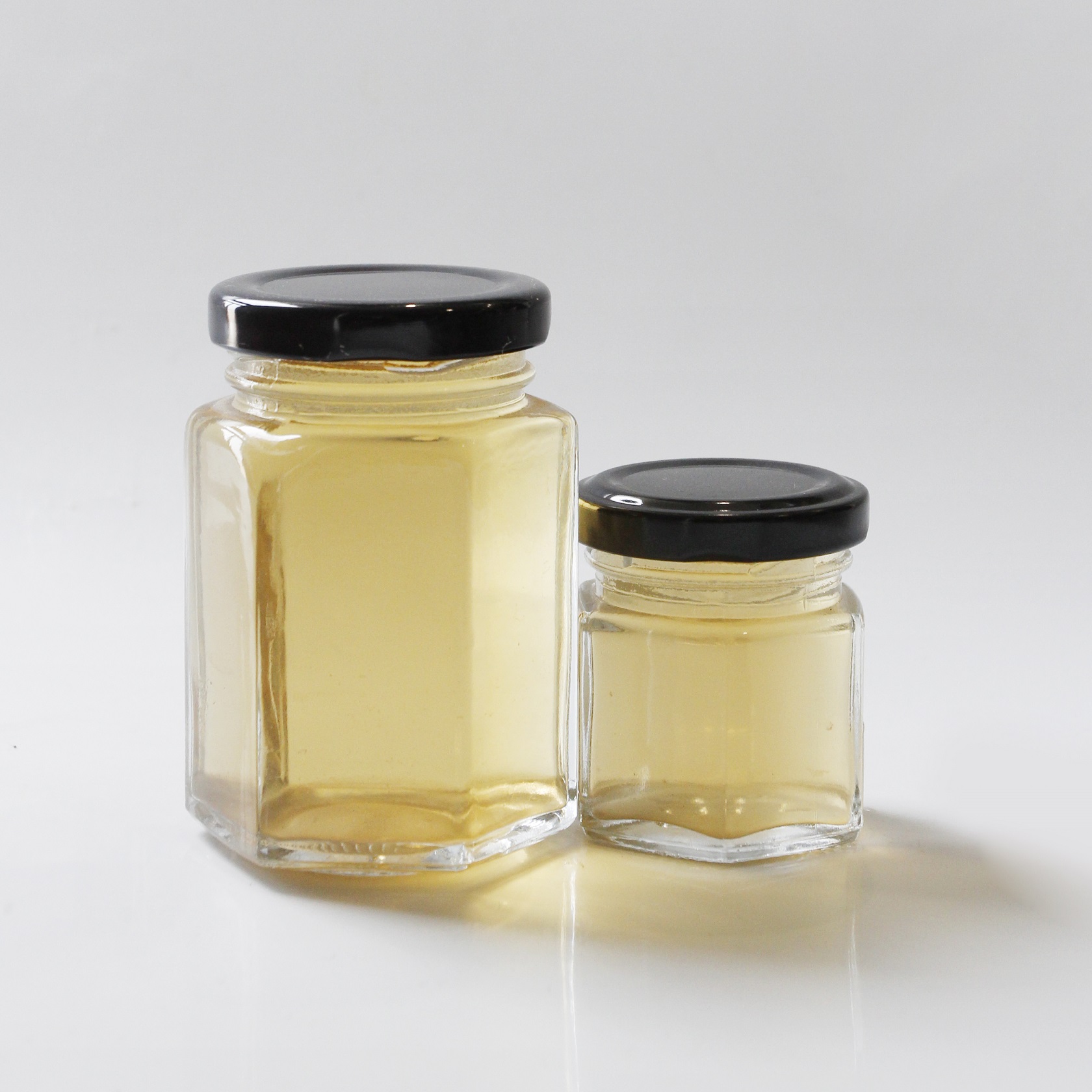 Traditional design hexagon honey glass jar Decal honeycomb glass jars Screw Cap empty glass jars with lids for honey