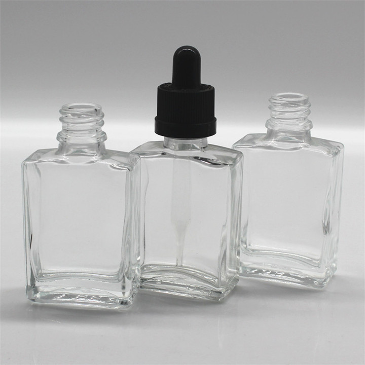 Transparent 15ml 30ml 50ml 100ml clear square glass bottle rectangle cosmetic essential oil bottle with dropper cap