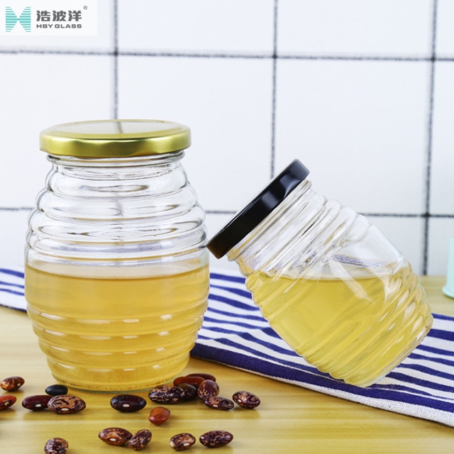 Transparent 380ml 730ml Honeycomb shaped honey glass jar with metal cap