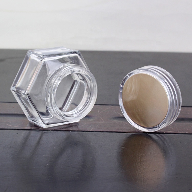 Transparent eye cream glass jar hexagon wholesale glass jar cosmetic with screw caps