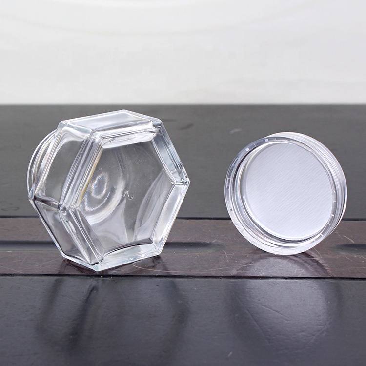 Transparent eye cream glass jar hexagon wholesale glass jar cosmetic with screw caps