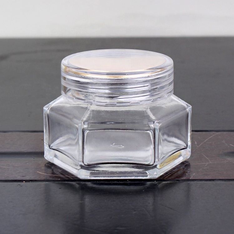 Transparent eye cream glass jar hexagon wholesale glass jar cosmetic with screw caps