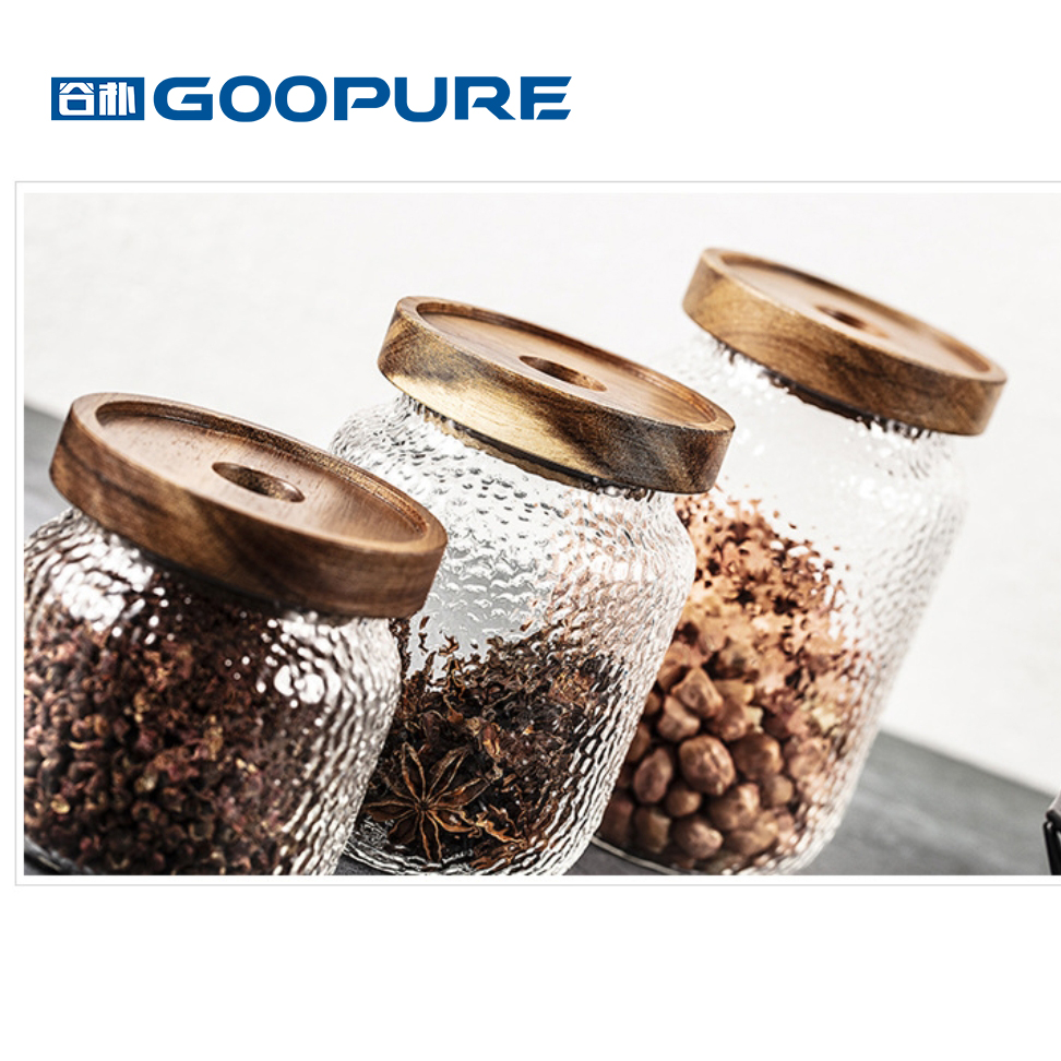 Transparent hammered glass sealed storage jar with acacia wood lid