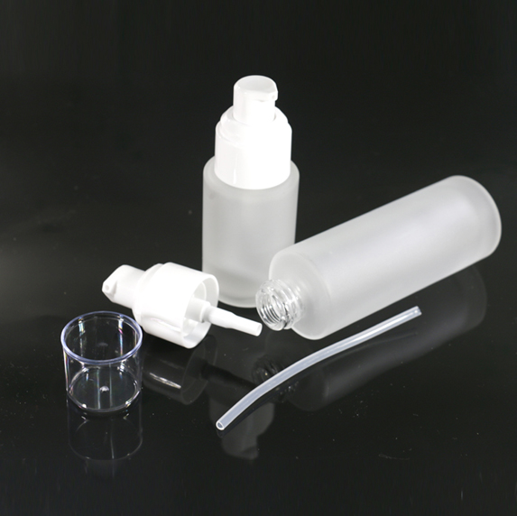 Transparent round pressed liquid foundation bottle emulsion packaging glass bottle