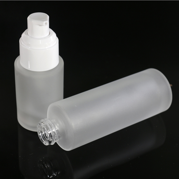 Transparent round pressed liquid foundation bottle emulsion packaging glass bottle