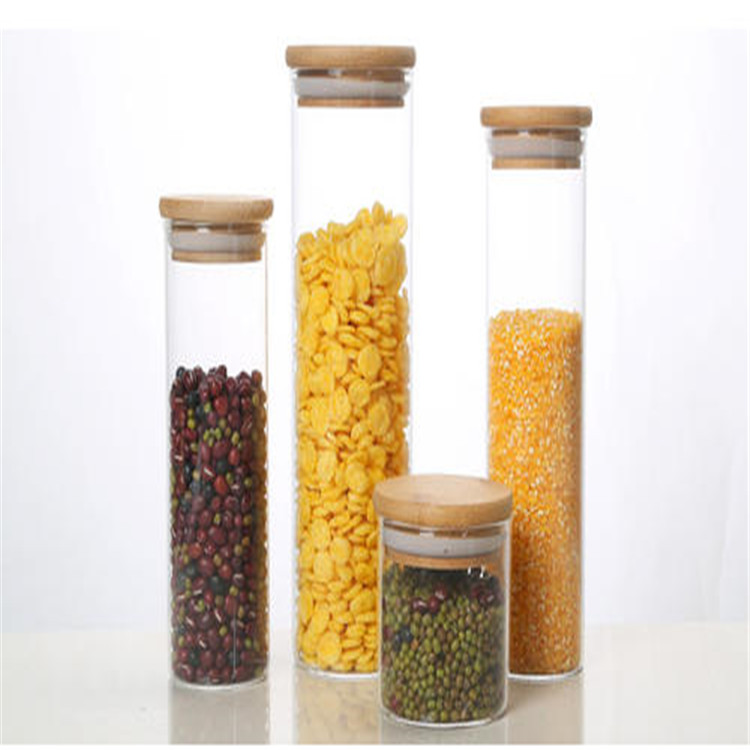 Tube round shape high borosilicate glass food candle container glass jar with bamboo and wood lid