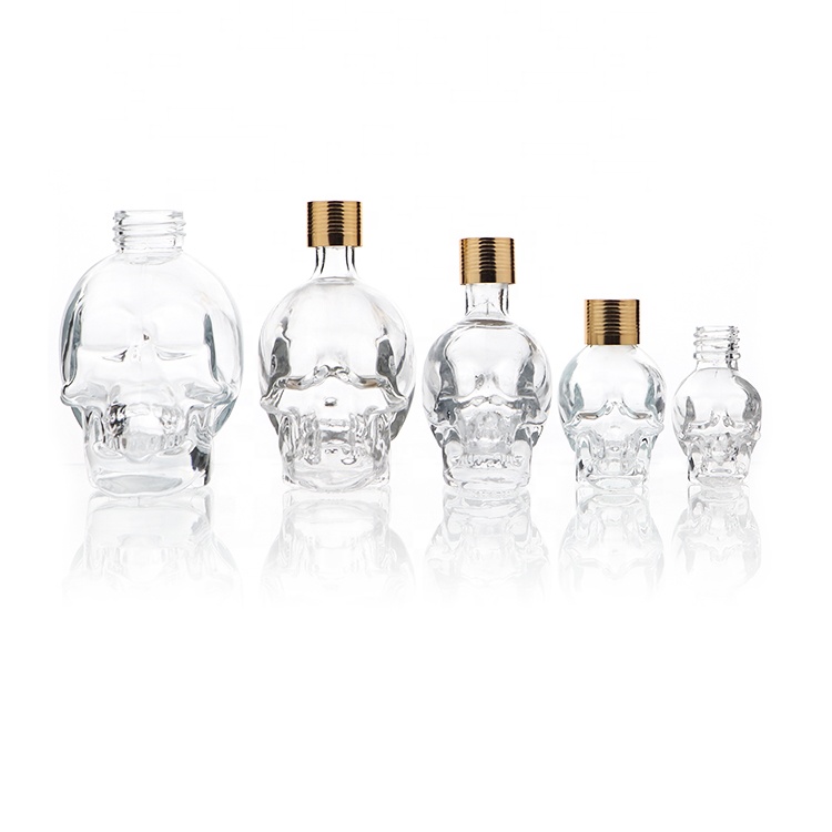 Unique Design Empty 15ml 30ml 100ml Skull Glass Perfume Diffuser Bottle With Spray Cap