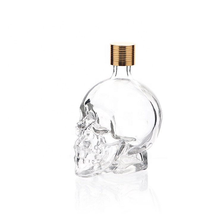 Unique Design Empty 15ml 30ml 100ml Skull Glass Perfume Diffuser Bottle With Spray Cap