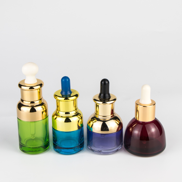 Unique cosmetic luxury glass dropper bottle with UV cap collar and glass dropper