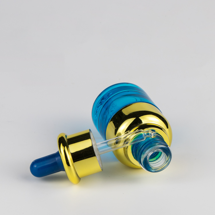 Unique cosmetic luxury glass dropper bottle with UV cap collar and glass dropper