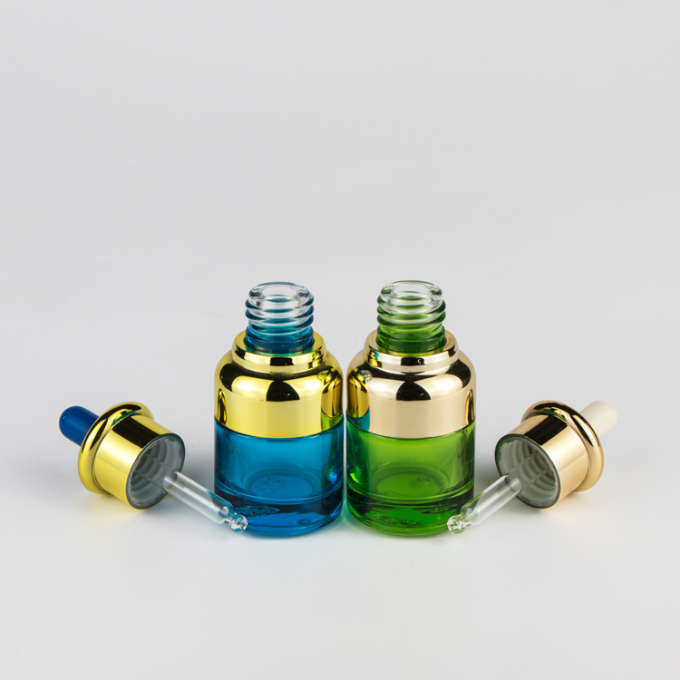 Unique cosmetic luxury glass dropper bottle with UV cap collar and glass dropper