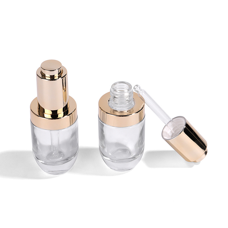 Unique cosmetic packaging perfume serum round shape 1 oz 30 ml transparent glass dropper bottle for essential oil