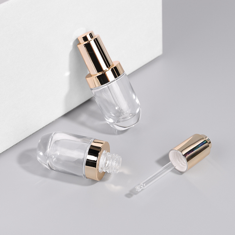 Unique cosmetic packaging perfume serum round shape 1 oz 30 ml transparent glass dropper bottle for essential oil