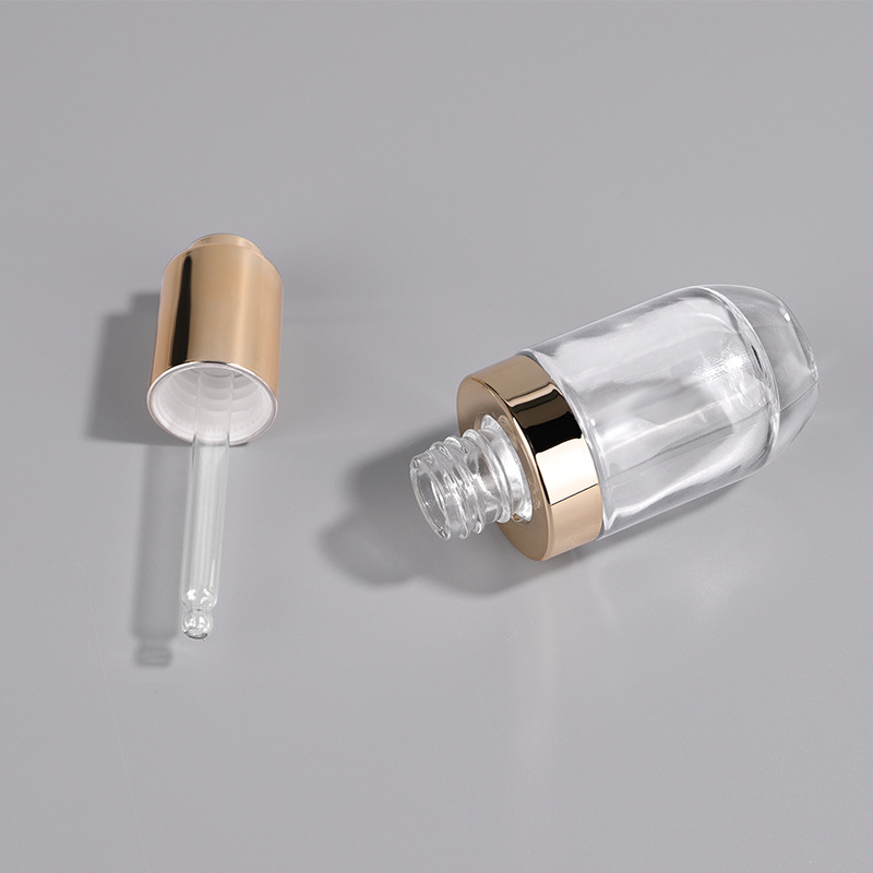 Unique cosmetic packaging perfume serum round shape 1 oz 30 ml transparent glass dropper bottle for essential oil