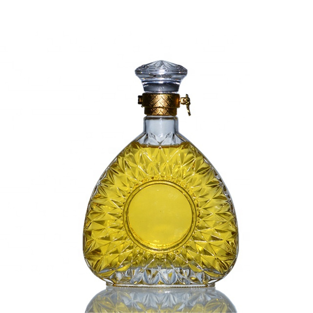 Unique design big embossed glass bottle with metal screw cap 0.5l 1l brandy bottle
