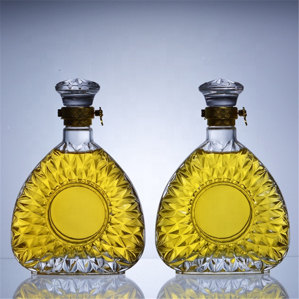 Unique design big embossed glass bottle with metal screw cap 0.5l 1l brandy bottle