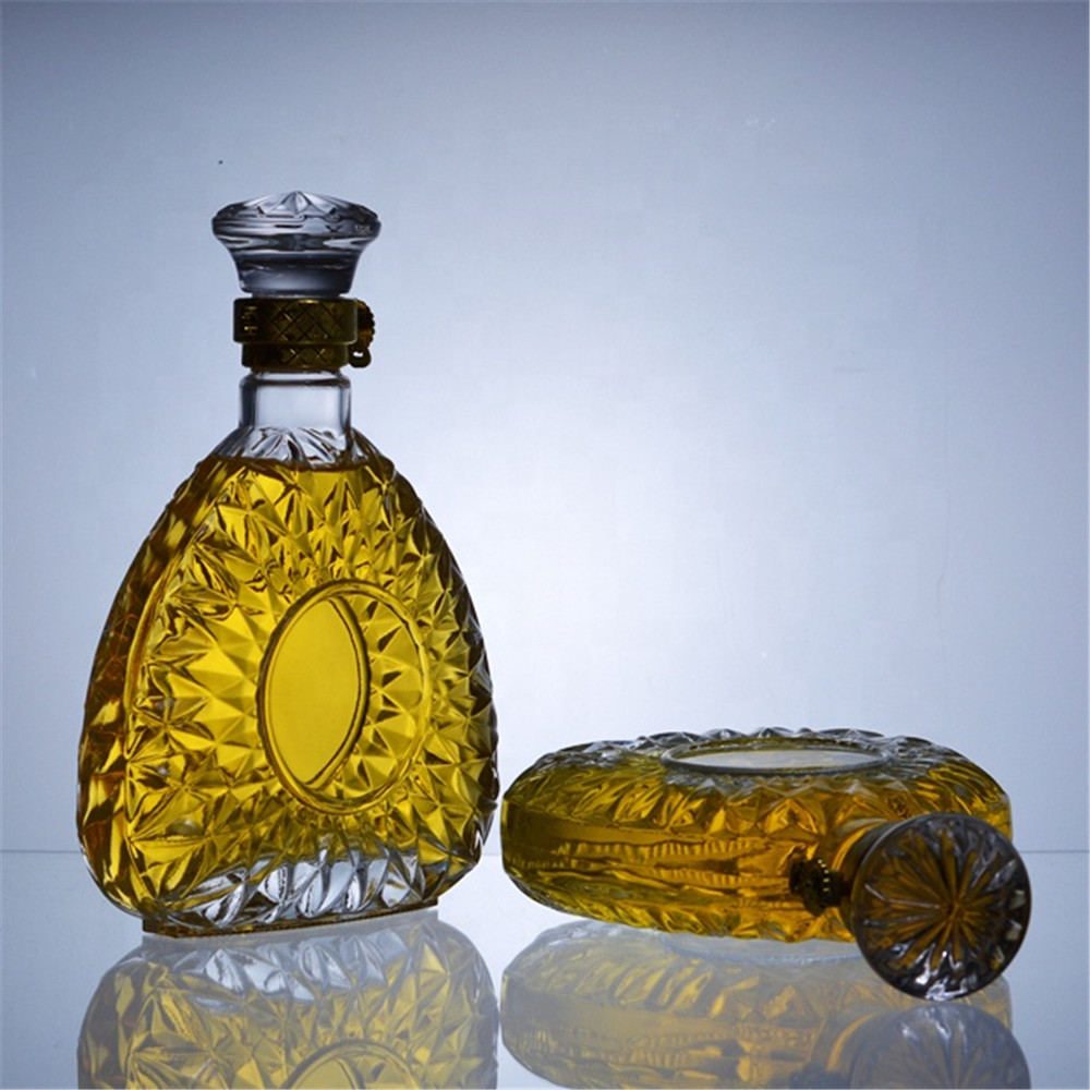 Unique design big embossed glass bottle with metal screw cap 0.5l 1l brandy bottle