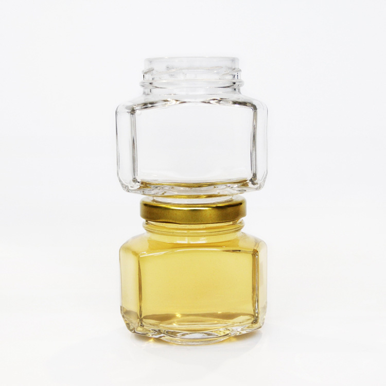 Unique design hexagonal honey packaging jars 150g honey glass bottle with golded lid 110ml