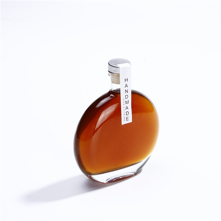Vanjoin Liquor Glass Bottles Rum Tequila Rakija Mezcal Flat Round Shape 250ml 500ml Vodka Gin Glass Bottle With Cork Lid