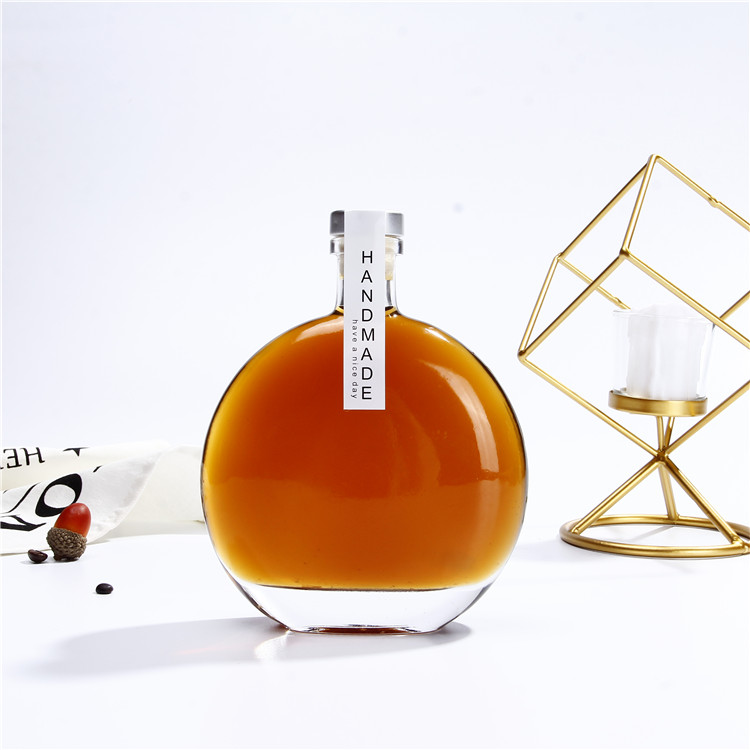 Vanjoin Liquor Glass Bottles Rum Tequila Rakija Mezcal Flat Round Shape 250ml 500ml Vodka Gin Glass Bottle With Cork Lid