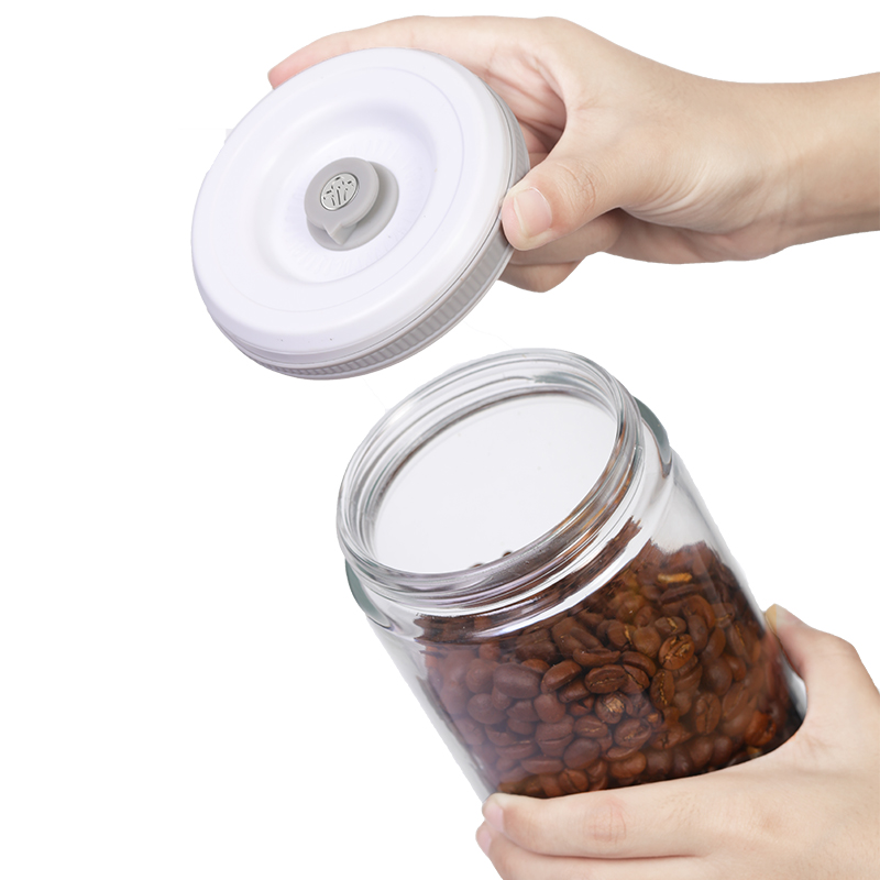 Various size glass vacuum storage jars set