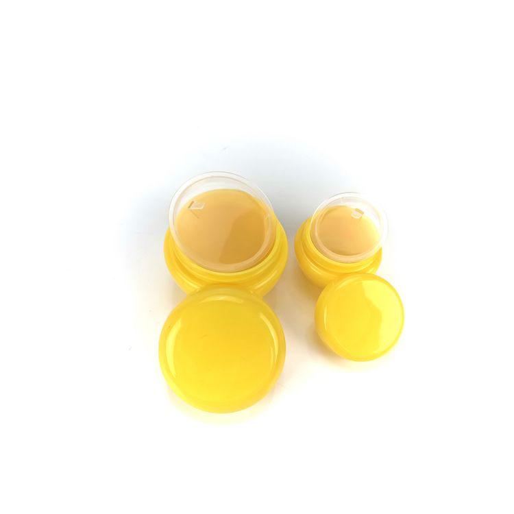 Various small-capacity cream jars and Cream jars in colored plastic