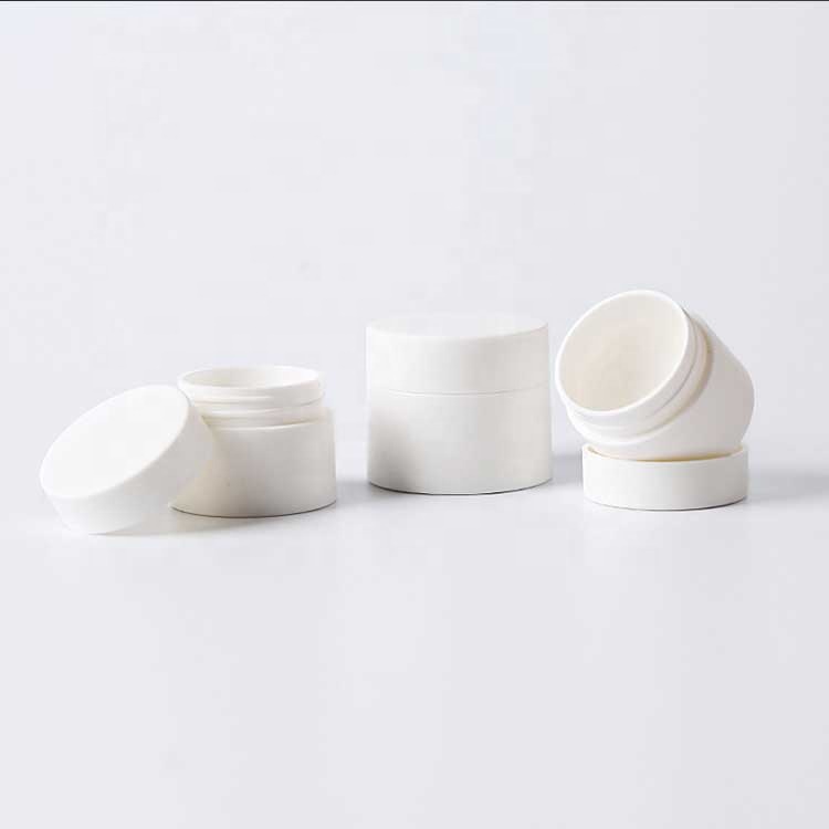 White plastic cosmetic packaging cream jar set