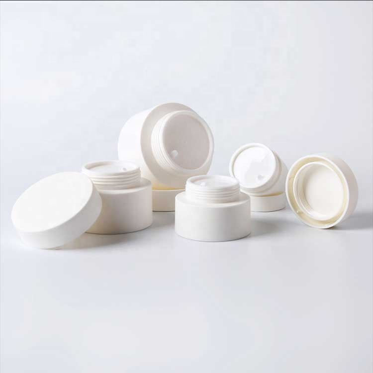 White plastic cosmetic packaging cream jar set