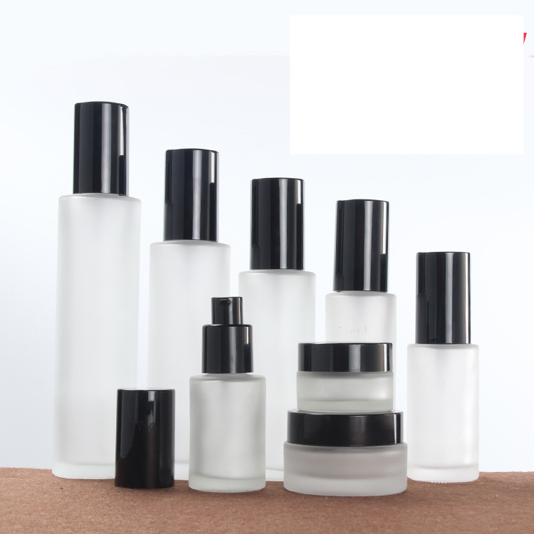 Whoesale 50ml 60ml 80ml 100ml frosted cream lotion bottle cosmetic packaging glass bottle with pump mist spray caps