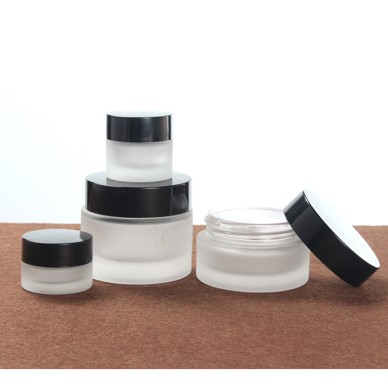 Whoesale 50ml 60ml 80ml 100ml frosted cream lotion bottle cosmetic packaging glass bottle with pump mist spray caps