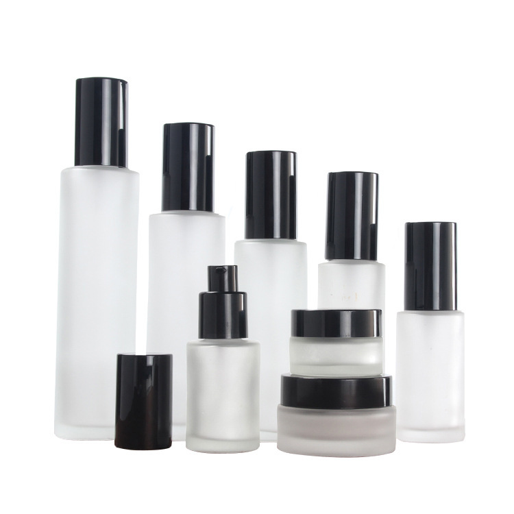 Whoesale 50ml 60ml 80ml 100ml frosted cream lotion bottle cosmetic packaging glass bottle with pump mist spray caps