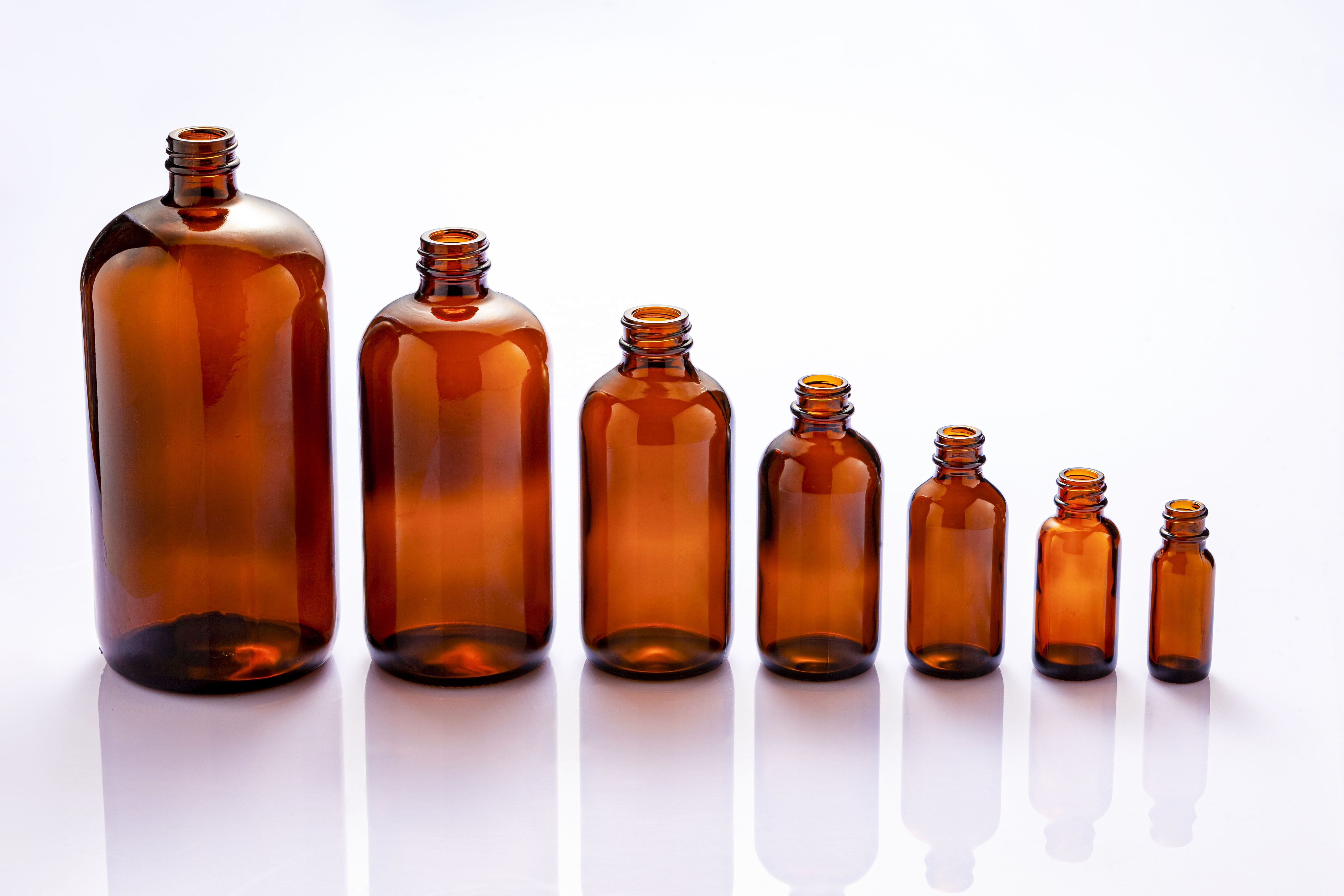 Wholesale 1/2OZ 1OZ 2OZ 4OZ 8OZ 16OZ 32OZ 120ml clear amber boston round glass bottle for liquid medicine